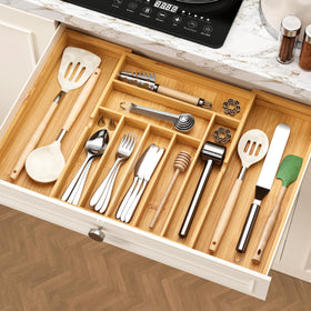 Inside view of the bamboo drawer organizer highlighting sturdy dividers.