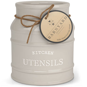 Barnyard Designs ceramic utensil holder on counter keeps spoons neatly organized.