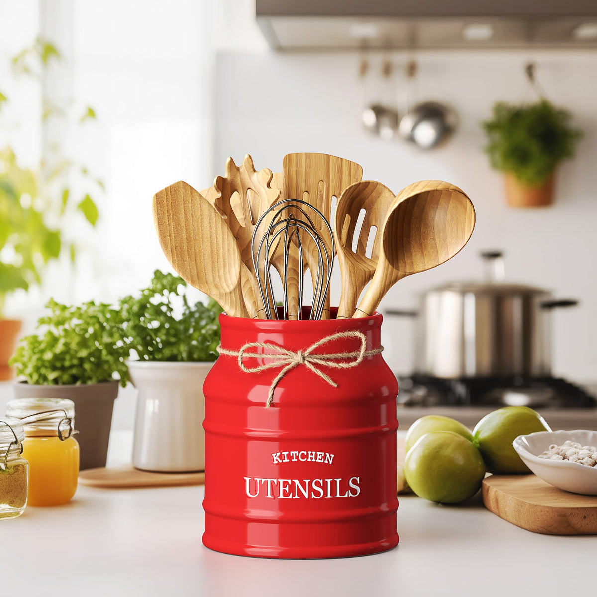 Barnyard Designs red ceramic utensil crock from the front view adds rustic kitchen decor.