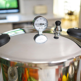 Barton's pressure canner on a gas stove highlights efficient heat transfer.