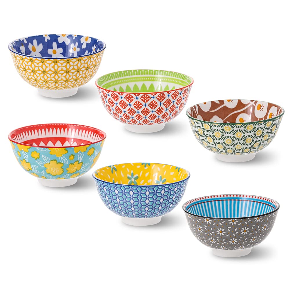 Batitie ceramic bowls with colorful patterns brighten the table for lively meals.