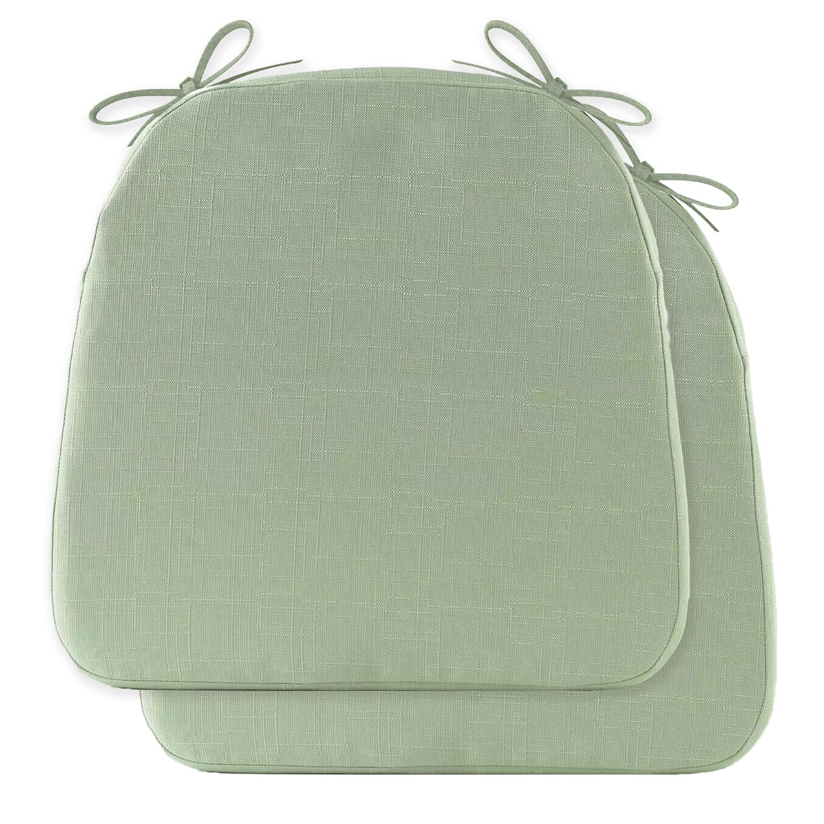 Battilo chair cushions in sage green set for indoor and outdoor dining.