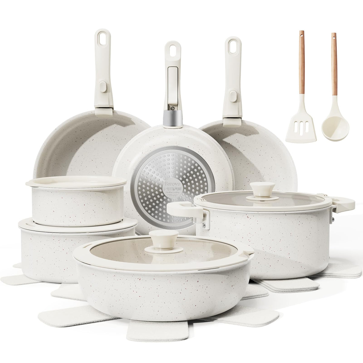 Bazova 22-piece set on stove top showing nonstick surface for easy release