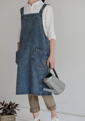 BCHWAY FAMILY denim apron in studio setting protects clothes during painting and crafts.