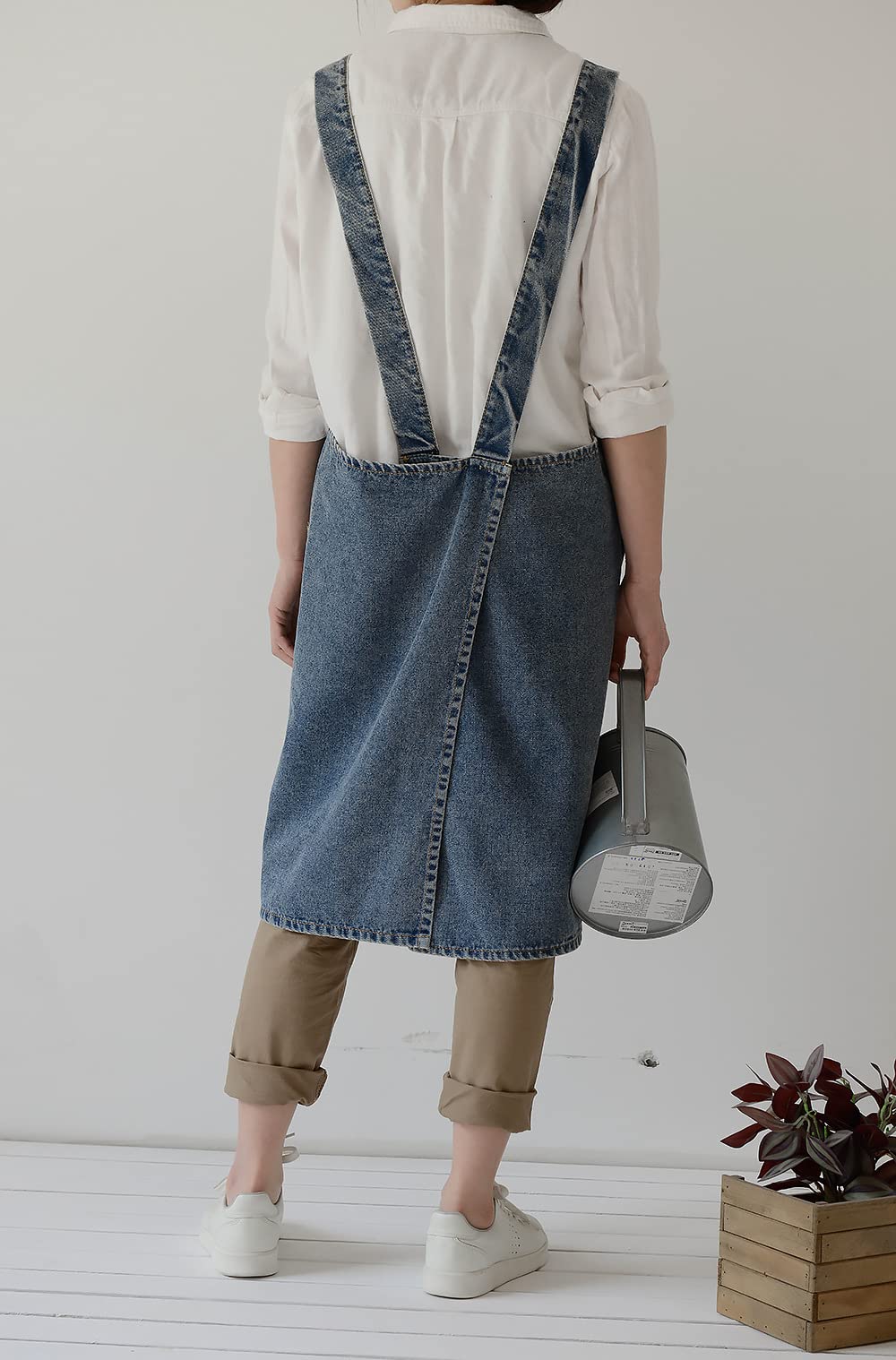 BCHWAY FAMILY denim apron for gardening keeps tools and notes handy while tending plants.