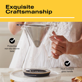 Bean Envy glass pour-over with dripper on top enables precise extraction.