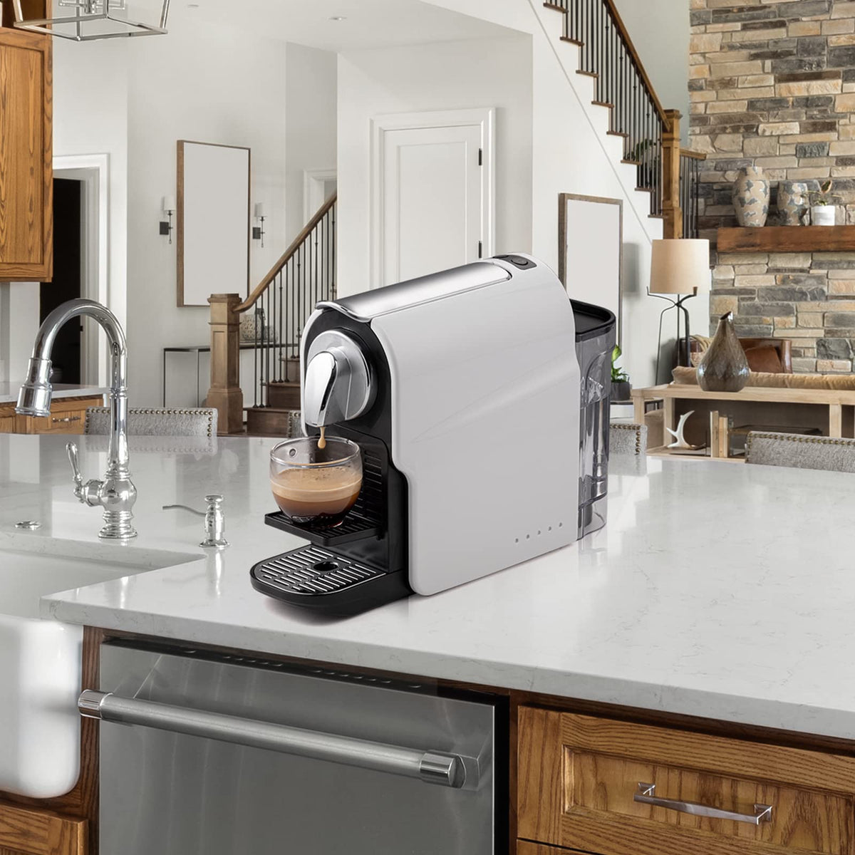 Beanglass espresso pod machine on a counter beside a mug for quick coffee.