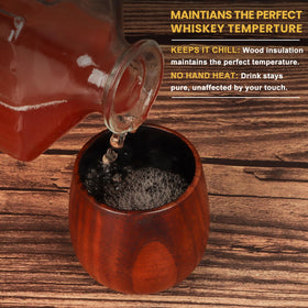 BearSkill Charred Wooden Bourbon Glass with ice demonstrates durable wood and chill-friendly design.