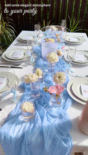 Beautane cheesecloth runner used as chair sash for stylish seating.