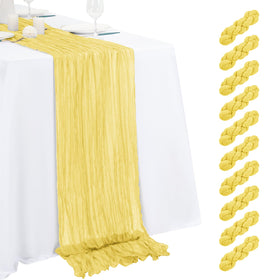 Beautane light yellow cheesecloth table runner with pleats drapes elegantly for weddings.