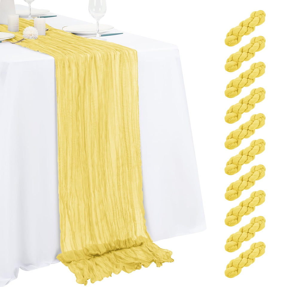 Beautane light yellow cheesecloth table runner with pleats drapes elegantly for weddings.