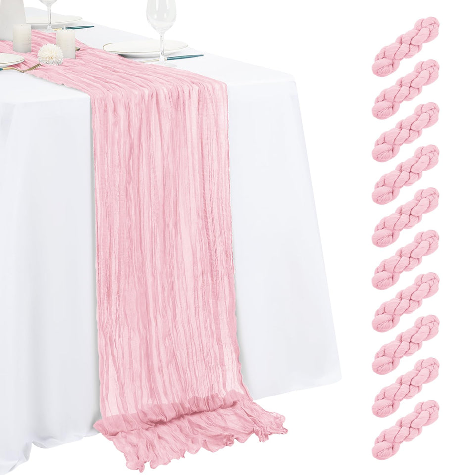 Beautane light pink cheesecloth table runner with soft drape for weddings.