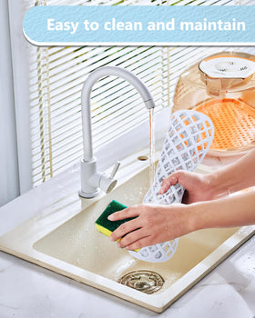 BEHOK silicone sink protector with non-slip base stays secure during washing.
