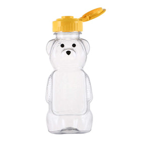 Bekith clear bear bottle with yellow lid for fresh honey.
