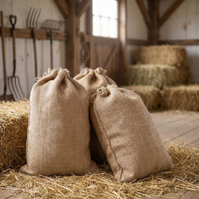 Bekith natural burlap sacks laid flat to show size and durability.