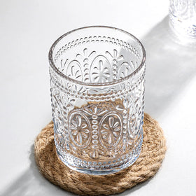 Bekith vintage clear glasses on a dining table elevate beverage presentation.