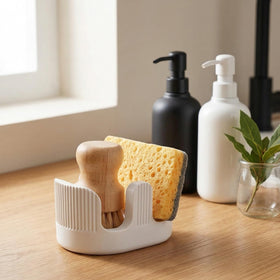 BekPooQ fits two standard sponges, plus dish brushes.