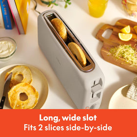 BELLA 2-Slice Slim Toaster slim profile fits compact kitchens for easy storage.