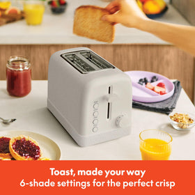 BELLA 2-Slice Toaster cord wrap keeps countertops tidy.