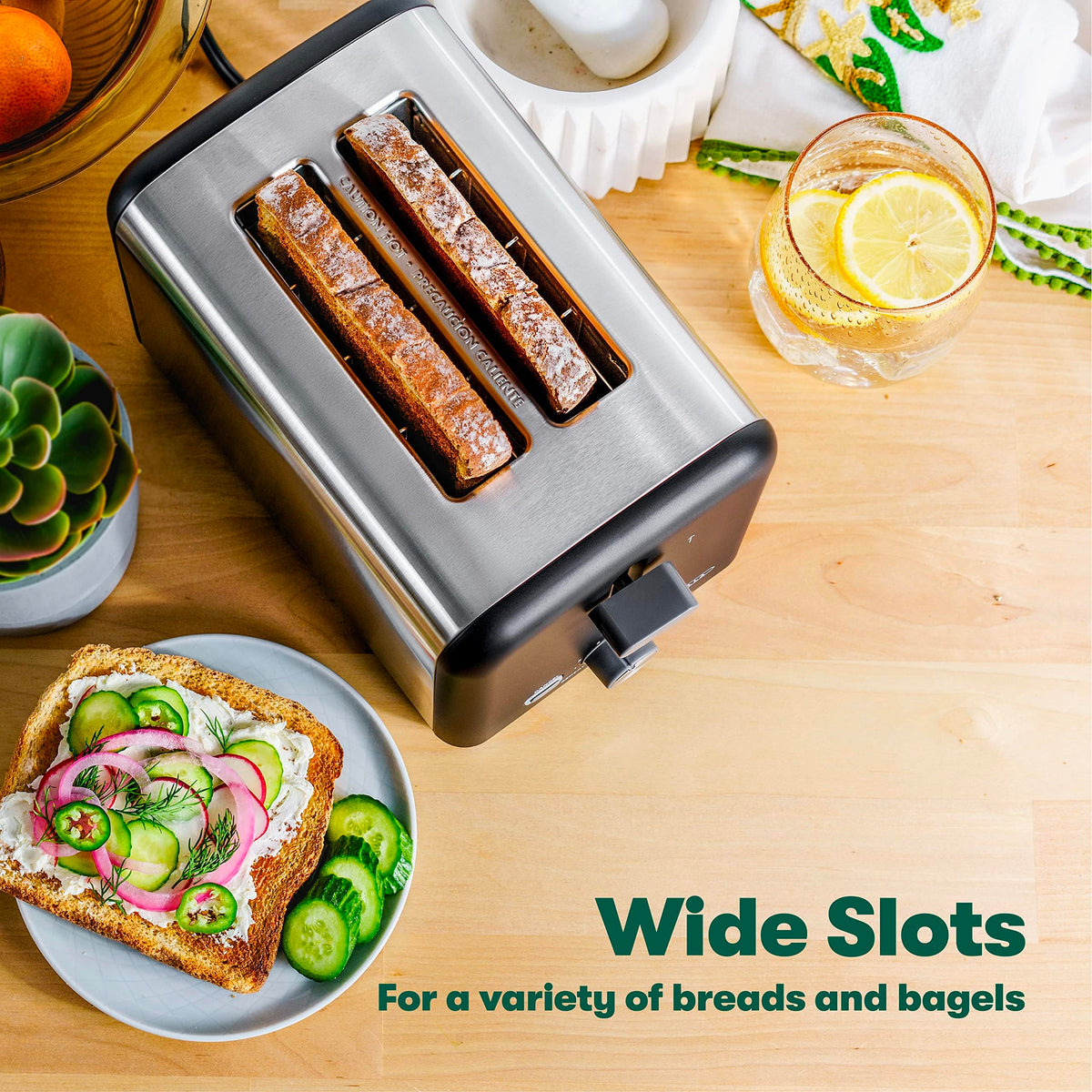 BELLA 2 Slice Toaster drop-down crumb tray simplifies cleanup.
