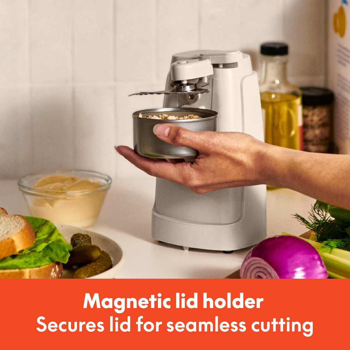 BELLA can opener with auto-turn for quick, one-touch lid release