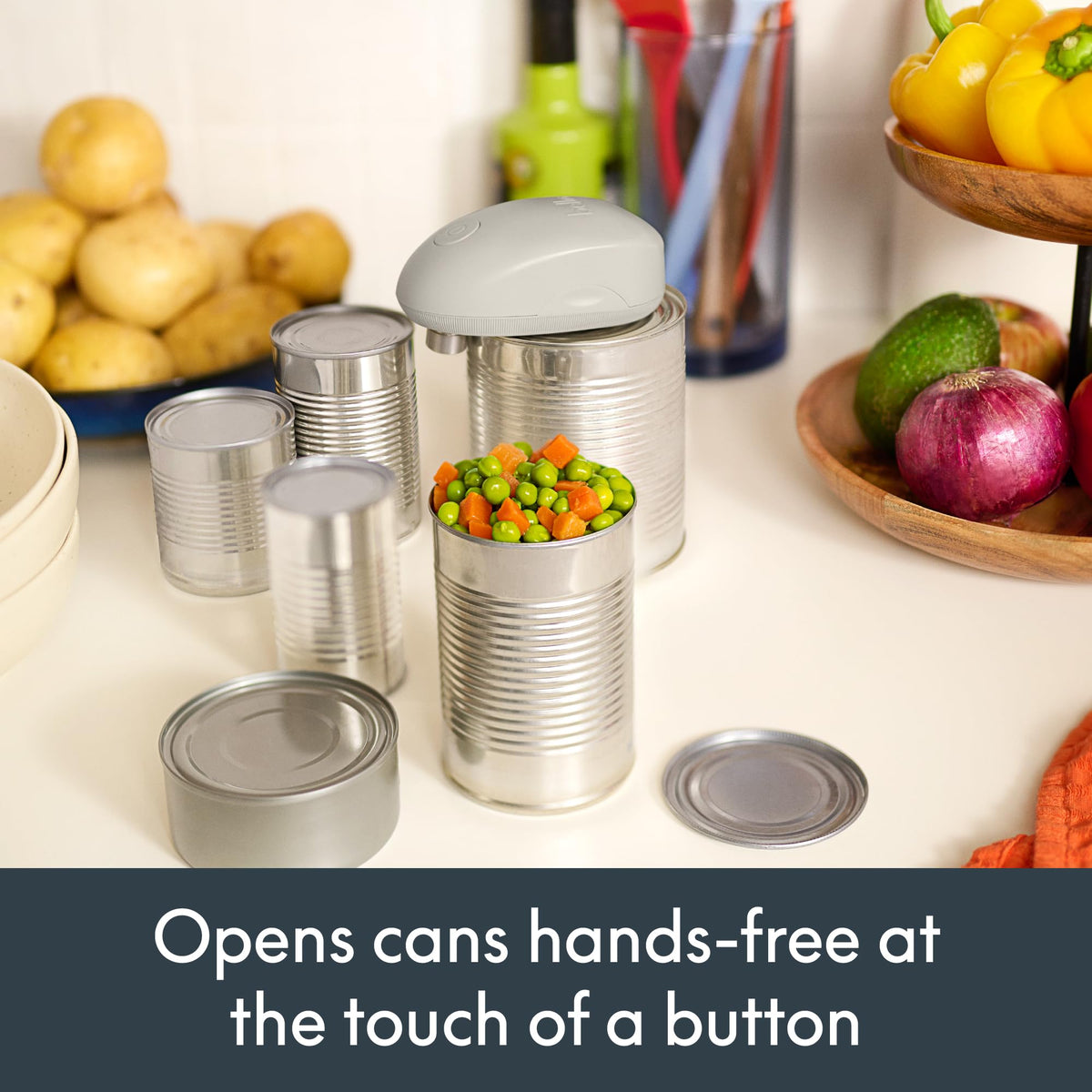 Bella Automatic Can Opener performing a smooth 360-degree cut.