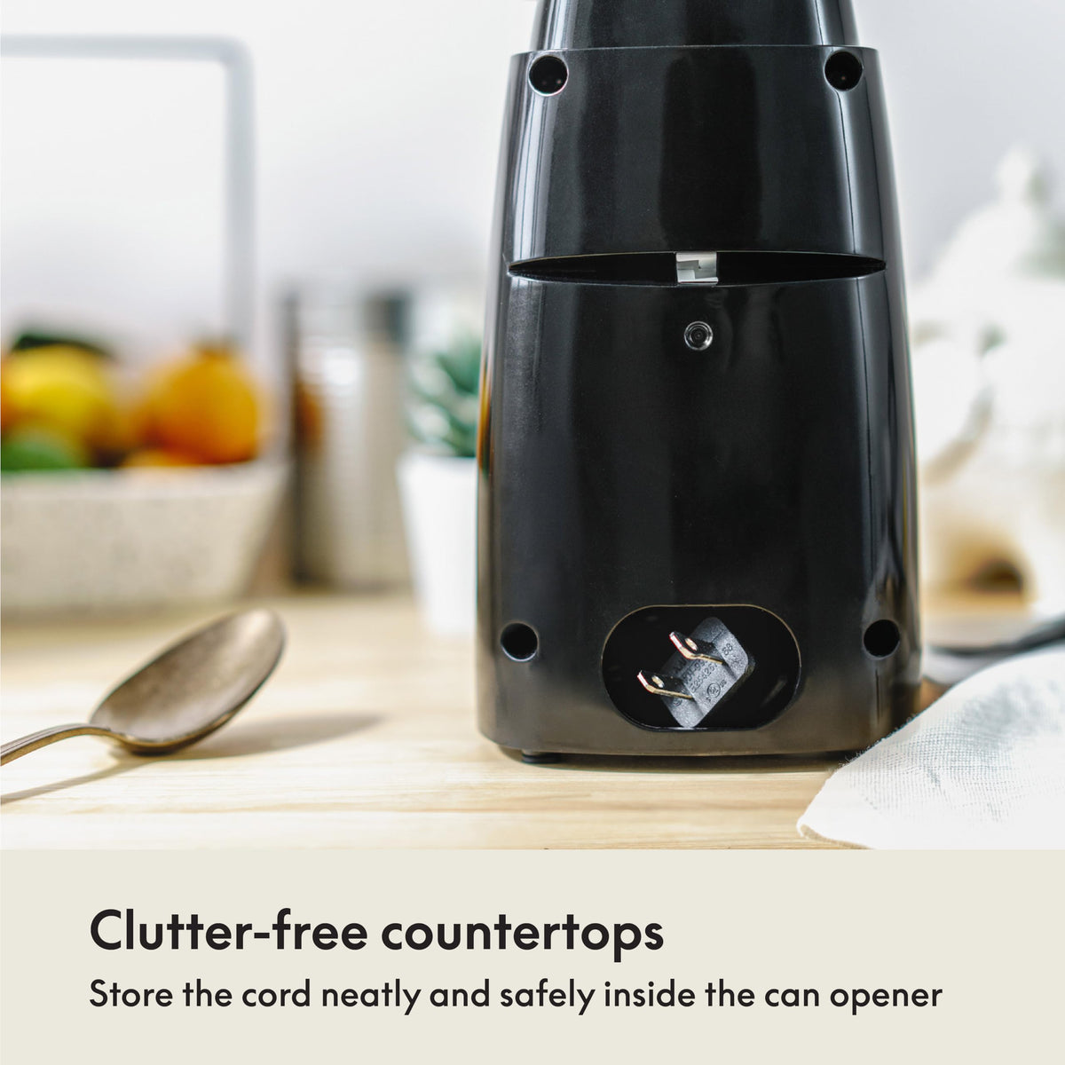 BELLA electric can opener in black finish complements modern kitchens.