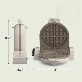 BELLA Flip-n-Store waffle maker power indicator light during preheat and ready states.