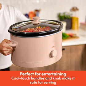 Cool-touch handles on Bella slow cooker for safe lifting of hot meals.