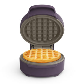 Bella Snack-n-Store mini waffle maker in plum, compact and space-saving.