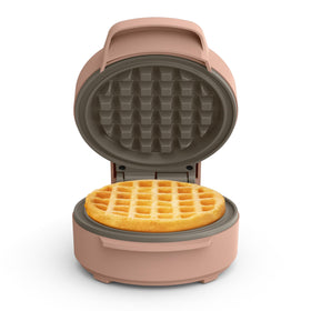 Bella Snack-n-Store Mini Waffle Maker in Blossom, front view, compact for small kitchens.