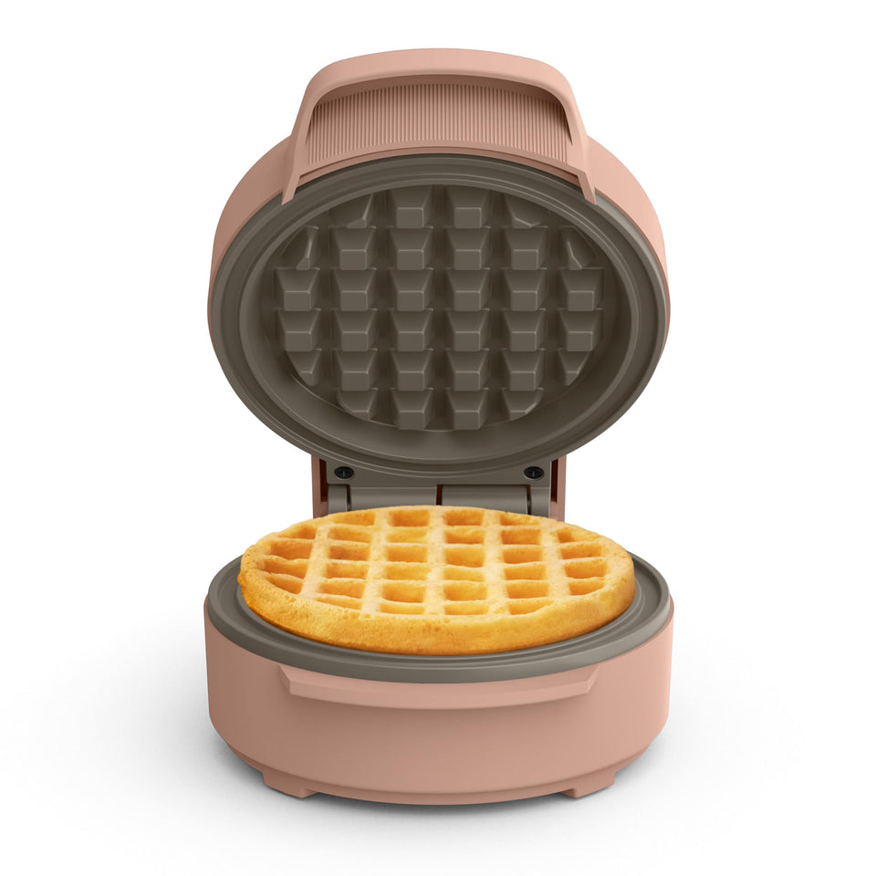 Bella Snack-n-Store Mini Waffle Maker in Blossom, front view, compact for small kitchens.