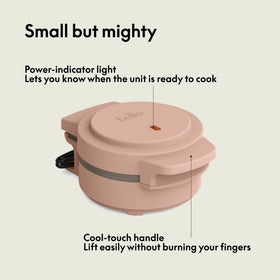 Bella Snack-n-Store Mini Waffle Maker Blossom, side view, cool touch handle for safe cooking.