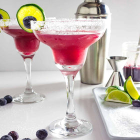 Bella Vino whiskey goblets pair with whiskey sours for refined sipping.