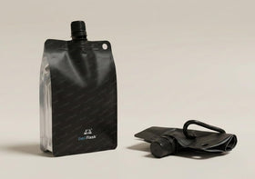 BellFlask spill-proof screw cap shown for leak-free transport in bags.