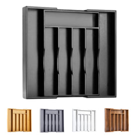 Bellsal expandable bamboo silverware organizer in the drawer keeps cutlery neatly organized.