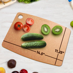 Belwares composite wood cutting board with hanging hole for easy storage.