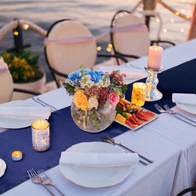 Bencailor navy satin runner showcased on a banquet table for weddings.
