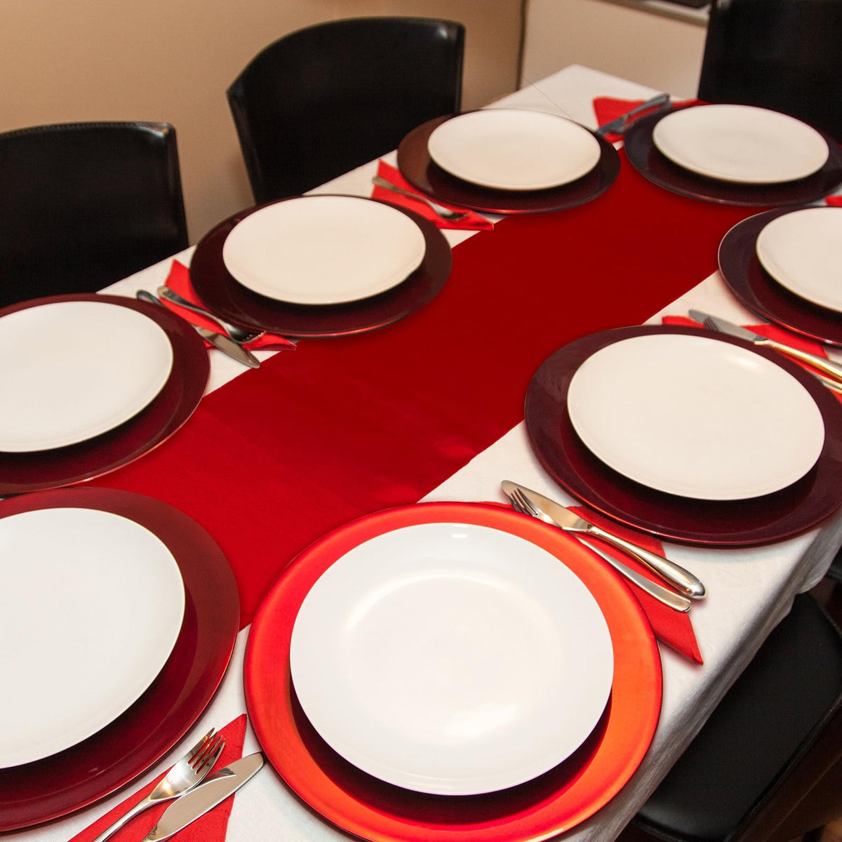 Bencailor red satin table runner chairs decorated for events.