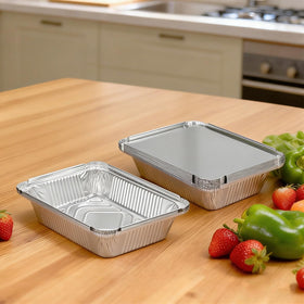 Benestanti foil pans with cardboard covers ensure secure, fresh takeout and storage.