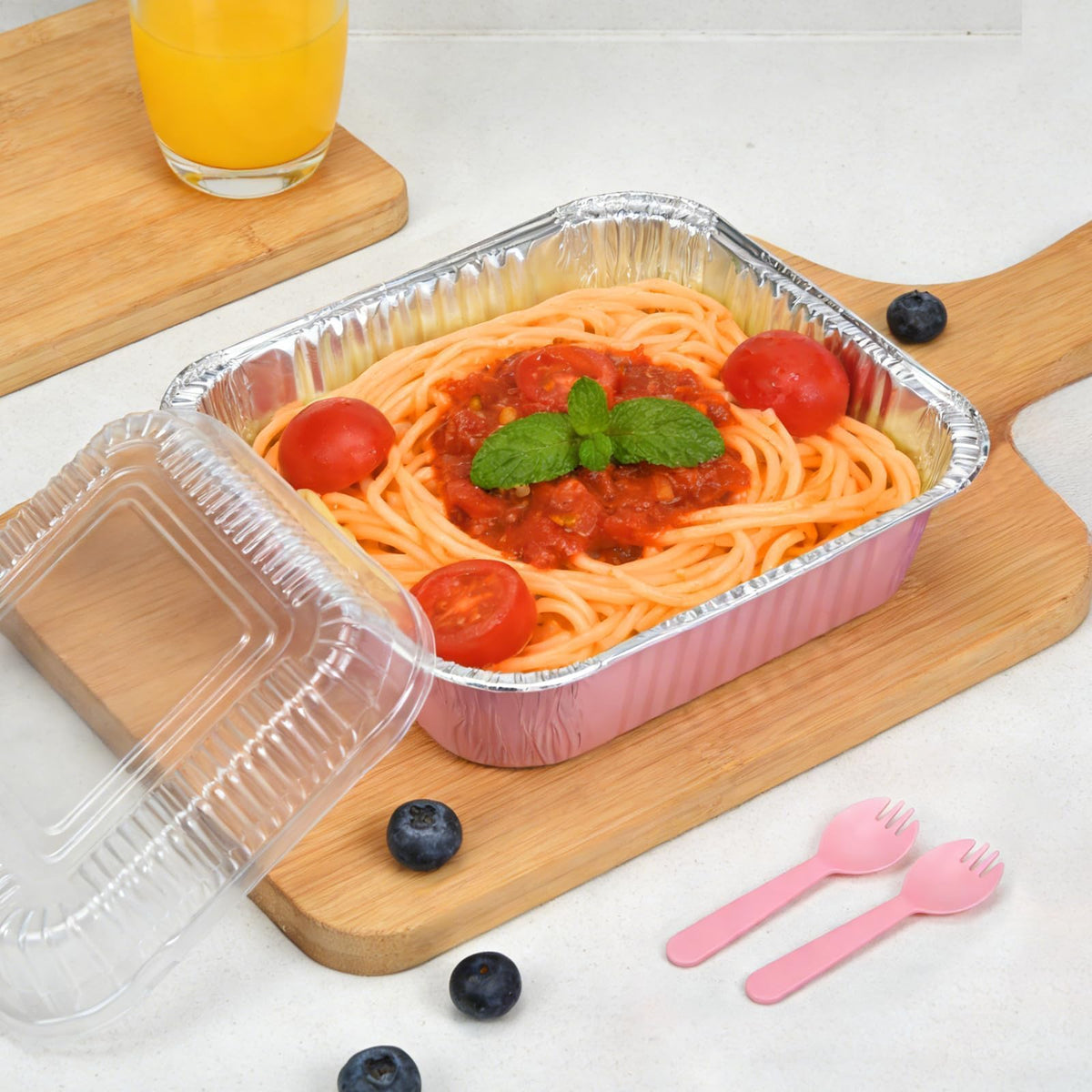 Benestanti square pink pan top view, showcasing compact bakeware for catering.