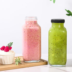 Benestanti six-pack glass bottles with black caps for pantry organization.