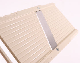 Benriner thickness dial on Jumbo Mandoline Slicer allows 0.5 to 10 mm slices.
