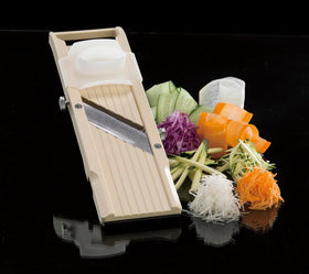 Benriner beige non-slip base keeps the slicer stable.