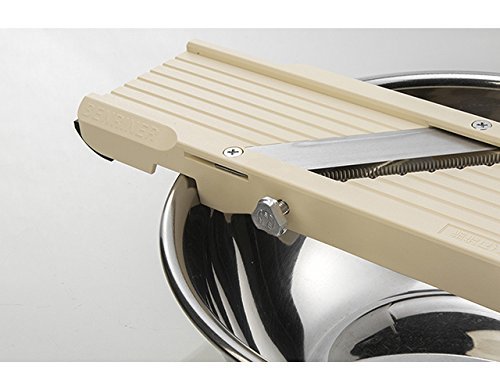 Benriner No. 64 bowl ledge catches slices for minimal mess.