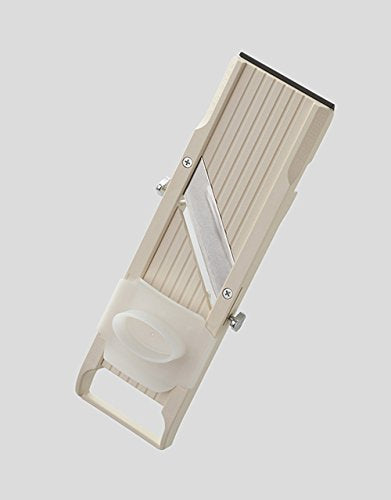 Benriner No. 64 interchangeable blades enable fine, medium, and coarse cuts.