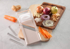 Benriner madoline interchangeable blades setup enables light, medium, and coarse cuts