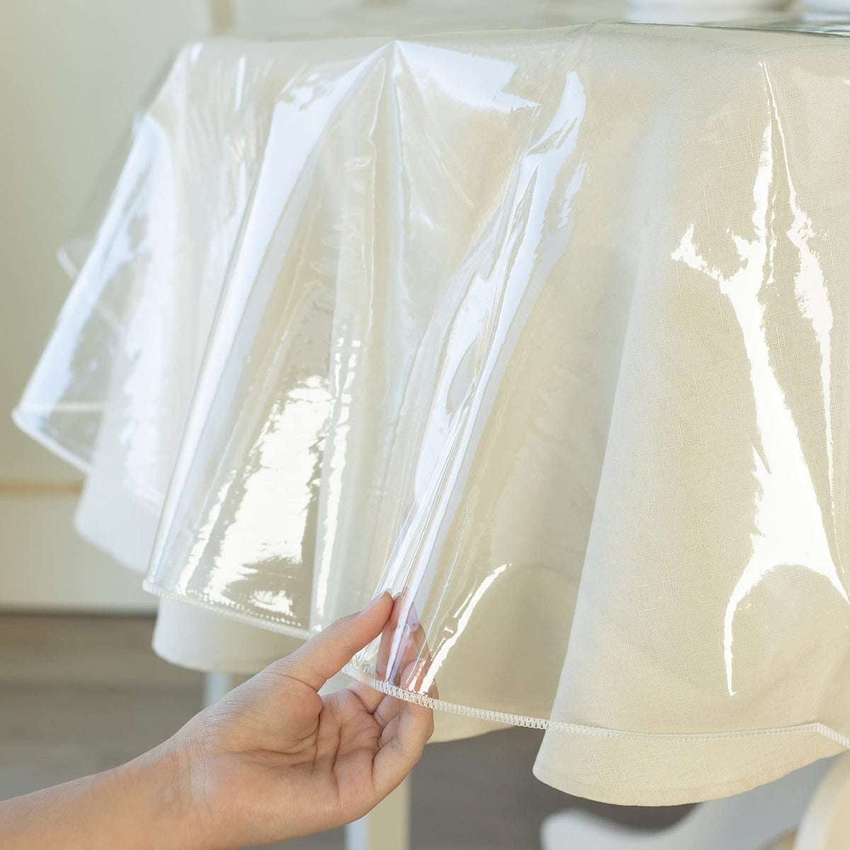 Benson Mills clear tablecloth edge finish closeup highlights durable clean-sewn edge