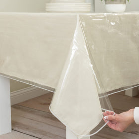 Benson Mills edge-sewn crystal-clear tablecloth offers a neat finish and durability.
