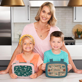Bentgo Kids trains prints lunch box lid closed, leak-proof seal for mess-free meals.